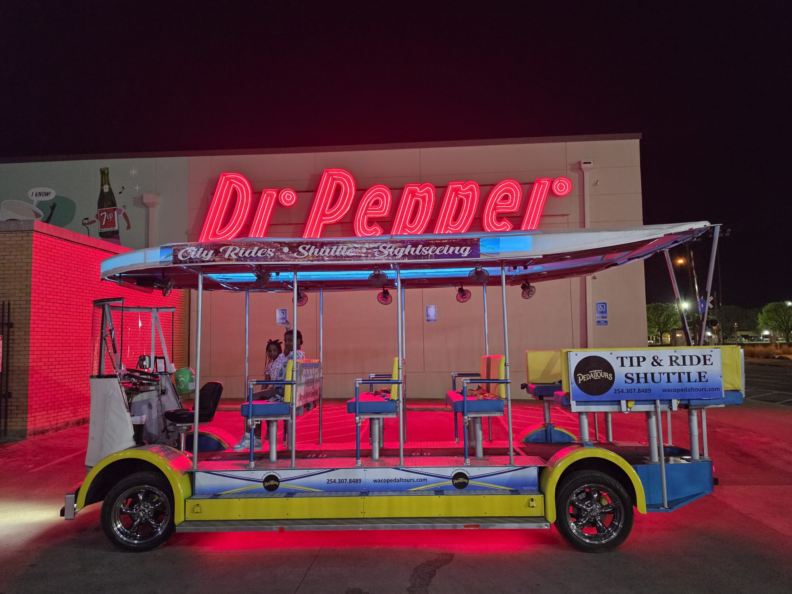 Waco Pedal Tours party bike night ride with yellow holiday lights