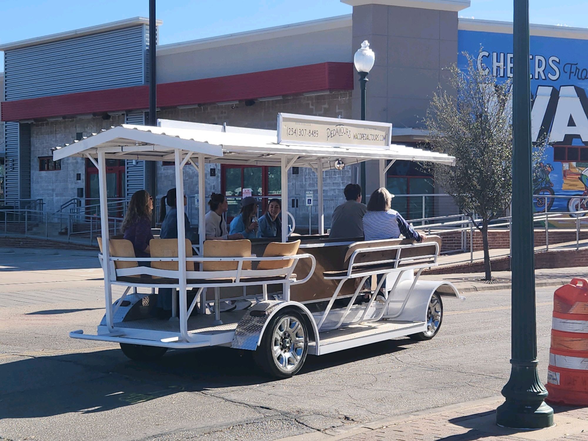 Waco Pedal Tours #1 Party Bike canopy lit up at night